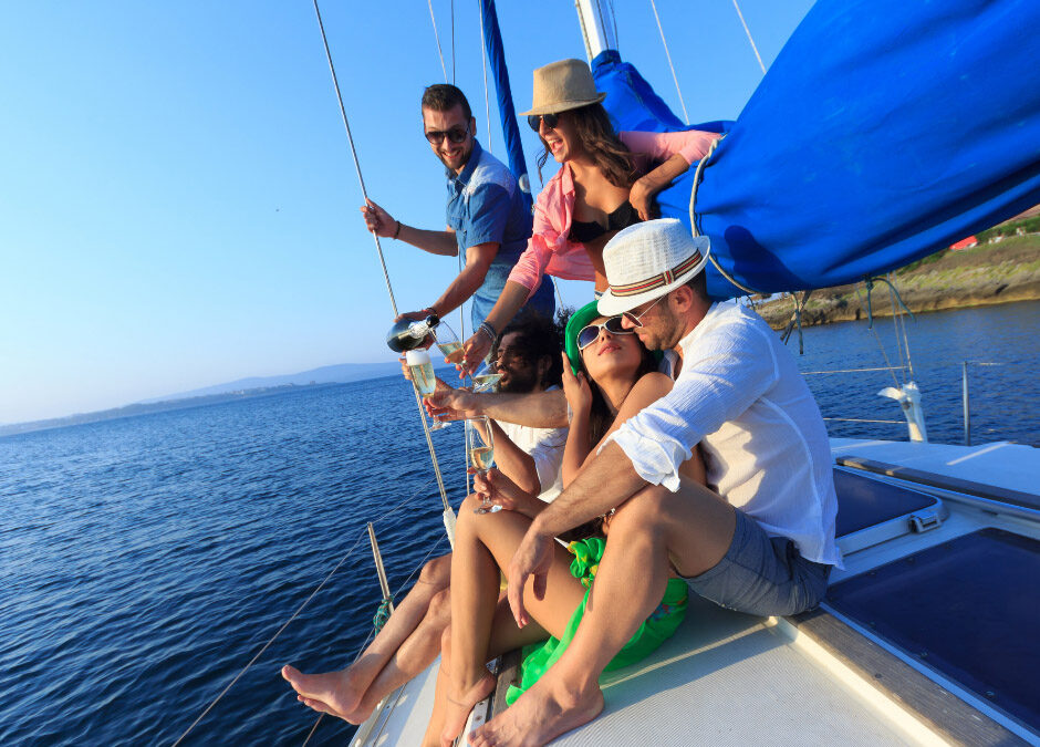 A group of friends enjoying a sunny day on a yacht